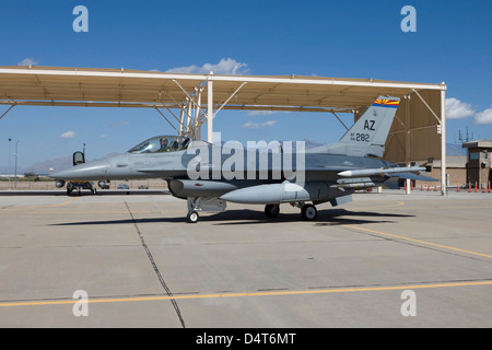 An F-16 taxi's out to the runway at Davis-Monthan Air Force Base, Arizona. Stock Photo
