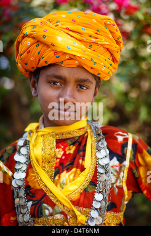 Indian boy in colorful clothes wearing a turban Stock Photo - Alamy