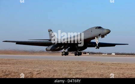 A 7th Bomb Wing B-1B Lancer takes off in the late afternoon from Dyess Air Force Base, Texas. Stock Photo