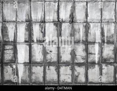 Old gray concrete wall tiles background texture Stock Photo