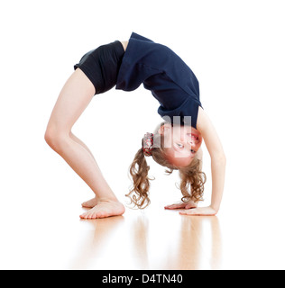 young girl doing gymnastics over white background Stock Photo