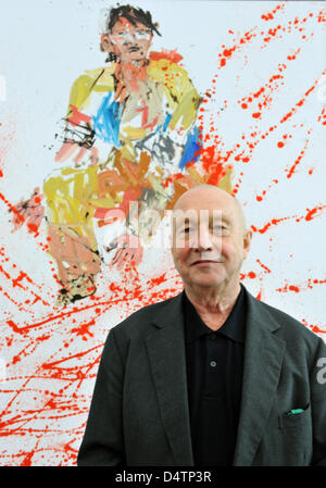 German artist Georg Baselitz stands in front of the painting ?Modern Painter? (2007) in the exhibition ?Baselitz? at Frieder Burda Museum in Baden-Baden, Germany, 20 November 2009. The exhibition offers a comprehensive insight into the artistic work of Georg Baselitz and will be on display at Frieder Burda Museum and Staatliche Kunsthalle Baden-Baden from 21 November 2009 until 14  Stock Photo