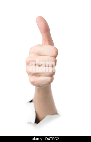 Human showing thumbs up through the paper Stock Photo