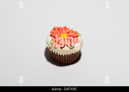 Cupcake decorated with flower Stock Photo