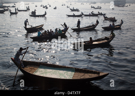 Taxi boats with commuters crossing Buriganga river, Dhaka, Bangladesh.