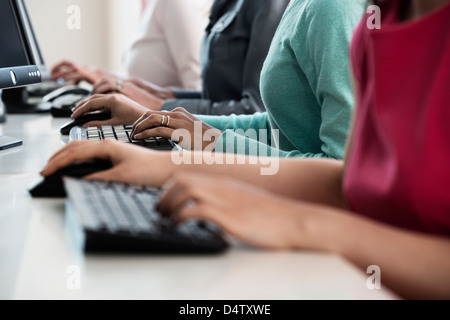 Businesswomen working at computers Stock Photo