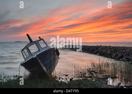 Moored fishing boat on shore, Vänern, Sweden, Europe Stock Photo