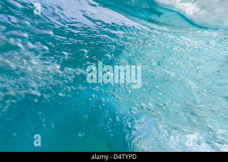 Crashing wave viewed underwater Stock Photo