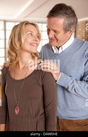 Father and daughter smiling together Stock Photo