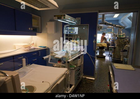 A pregnant waiting for a spinal anesthesia in a OT before a Cesarean in a hospital Stock Photo