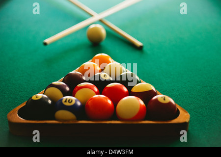 Balls arranged on pool table Stock Photo