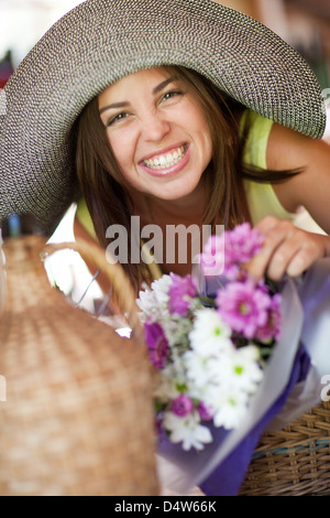 Woman holding bouquet of flowers