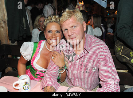 Former soccer professional Stefan Effenberg and his wife Claudia celebrate at the Kaefer festival tent as the 2010 Oktoberfest kicks off in Munich, Germany, 18 September 2010. The world's biggest folk festival takes place from 18 September until 03 October 2010 for the 177th time.  A total of six million visitors are expected. Photo: Felix Hoerhager Stock Photo