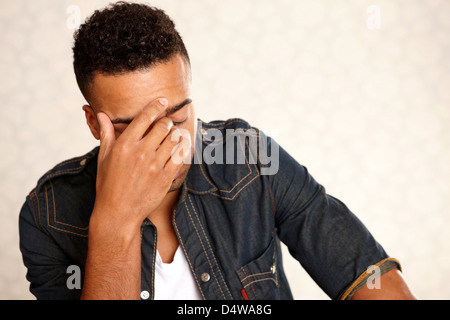 Close up of man's frustrated face Stock Photo