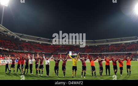 German Bundesliga, 5th day of play, 1 FC Nuermberg plays against Vfb Stuttgart at the easyCredit Stadium in Nuermberg, Germany, 22 September 2010. Nuermberg's team cheers after the 2-1 victory. Photo: Daniel Karmann Stock Photo