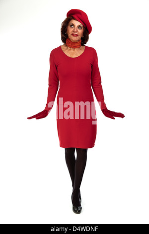 Fashionable senior woman. Wearing red hat. Isolated. Stock Photo