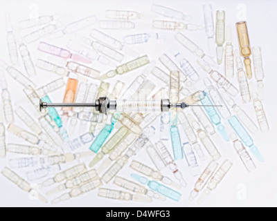 Close up of syringe and vials Stock Photo