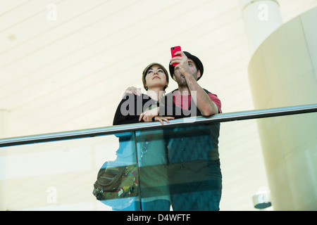 Couple taking picture with cell phone Stock Photo