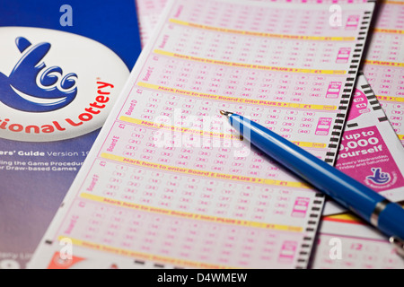 Close up of National Lottery Lotto slip form slips forms and pen England UK United Kingdom GB Great Britain Stock Photo