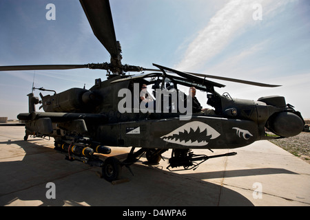 An AH-64D Apache Longbow parked at COB Speicher, Tikrit, Iraq. Stock Photo