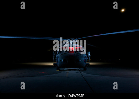 A UH-60 Black Hawk helicopter lit up by multiple external flash units, Tikrit, Iraq. Stock Photo