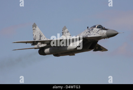 MIG-29 of the Slovak Air Force in digital camouflage over Hradec Kralove, Czech Republic. Stock Photo