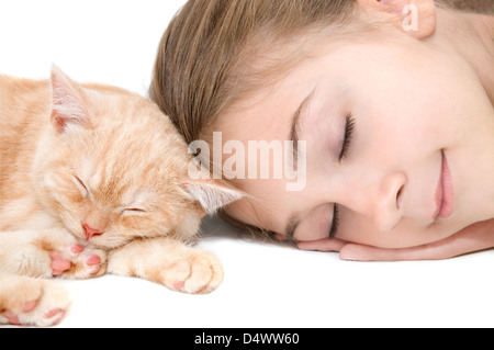 The girl with a red kitten of breed Scottish-straight are photographed on the white background Stock Photo