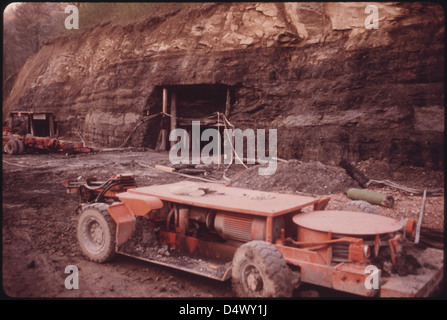 The Robin Mine, owned by the Alma Coal Corporation, is depicted in this 1974 image showing the installation of machinery as the mine opens near Clothier and Madison, West Virginia. It highlights the mining industry’s growth in the 1970s. Stock Photo