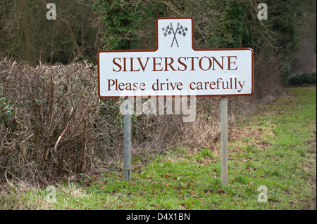 A road sign welcoming drivers to the Northamptonshire Village of Silverstone home of British Motor Racing and British Grand Prix Stock Photo