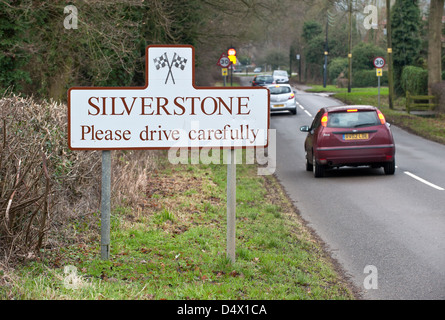 A road sign welcoming drivers to the Northamptonshire Village of Silverstone home of British Motor Racing and British Grand Prix Stock Photo