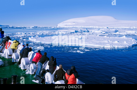 Tourists admiring the scenery near Antarctic Sound in Antarctica Stock Photo