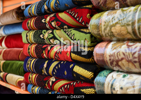 Closeup shot of ornate rugs and textiles at market in Dubai, United Arab Emirates Stock Photo