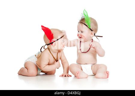 Two funny little children indians. Isolated on white background Stock Photo