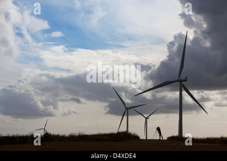 A photographer takes a picture at ScottishPower's Whitelee windfarm, East Renfrewshire. Stock Photo