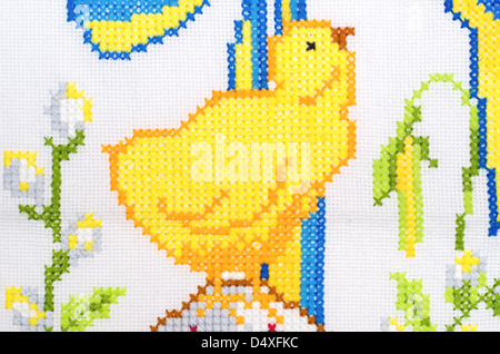 chicken as embroidered good by cross-stitch pattern Stock Photo