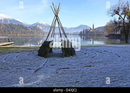 A wooden maze on the frost covered shores of Lake Bled Slovenia in winter Stock Photo