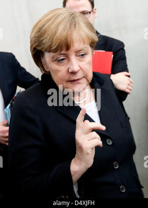 German Chancellor Angela Merkel leaves the European Affairs Committee of the German Bundestag parliament at Paul Loebe House in Berlin, Germany, 20 March 2013. Photo: KAY NIETFELD Stock Photo