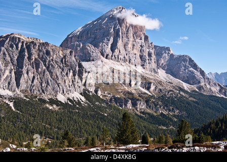Tofana di Rozes mountain peak with cloud on summit and blue sky around on Tofana mountain group in Dolomites mountains in Italy Stock Photo