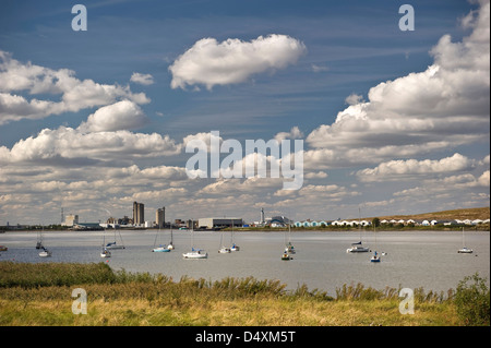 Small boats and dinghies moored on the River Thames near Erith, Kent, UK Stock Photo