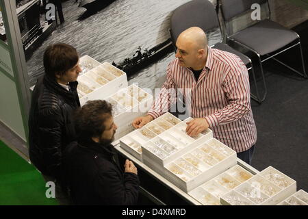 Gdansk, Poland. 20th March 2013.  20th International Fair of Amber, Jewellery and Gemstones in Gdansk Amber Expo fair hall. More than 450 Exhibitors from Poland, Belgium, Czech Republic, Germany, Italy, Lithuania and Ukraine, as well as trade visitors from over 50 countries. AMBERIF is a trade-only event – addressed to persons and businesses who trade in jewellery, jewellery art and functional art. Credit:  Michal Fludra / Alamy Live News Stock Photo