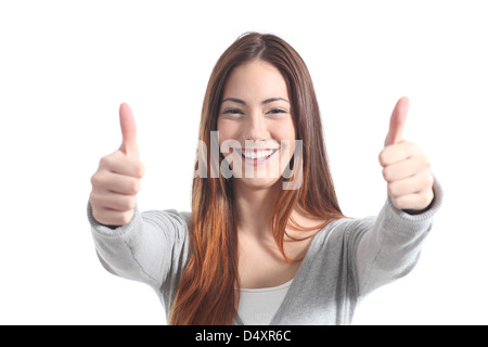 Beautiful woman smiling with both thumbs up on a white isolated background Stock Photo