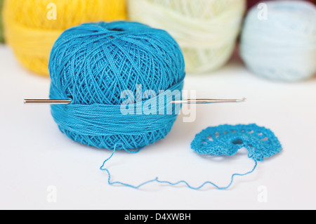 Crochet hook and colorful yarn Stock Photo