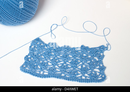 Crochet, blue yarn and crochet hook Stock Photo