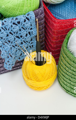 Baskets with crochet hook and yarn Stock Photo