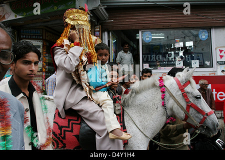 Groom on horseback at wedding procession in Mussoorie. Stock Photo