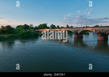 The old French Railway Bridge between Khone and Det islands in the Mekong River, Laos Stock Photo