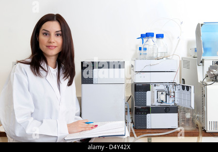 mass spectrometer, spectrometry female laboratory technician Stock Photo