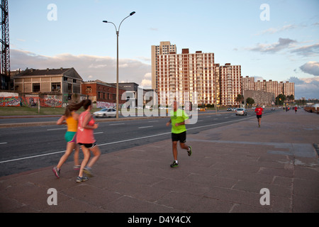 People exercising along the rambla coastal road in Montevideo, Uruguay Stock Photo