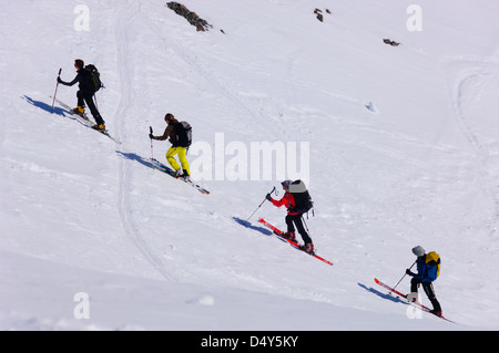 Ski alpinists ascending a slope in the Stubai Alps, Tirol, Austria. Stock Photo