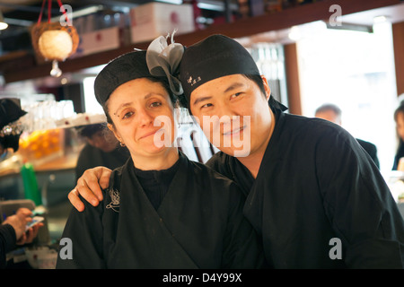 Staff and Tapas in the La Torna Restaurant, Santa Caterina Market, Barcelona, Spain. The cities markets have some great restaurants. Stock Photo